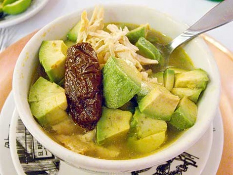 A cup of avocado rich caldo tlalpeño from Fonda el Refugio in Mexico City. 
