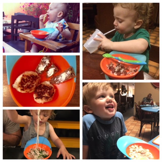 Kids traveling and eating with the orange Boon catch bowl.