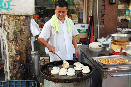 Green onion, or scallion, pancakes, on the street in Shanghai