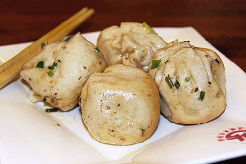 Sheng jian bao, pan-fried soup dumplings, in Shanghai