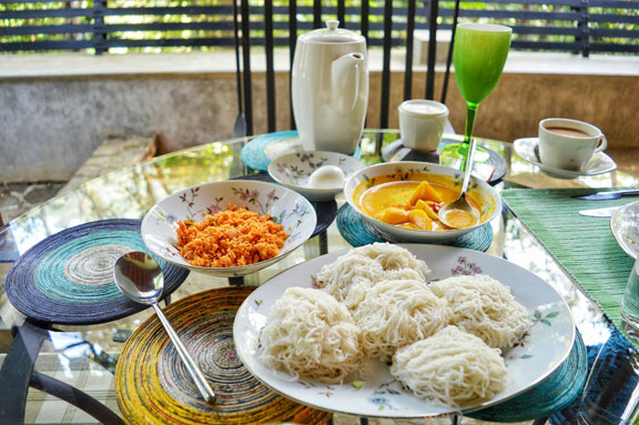 String hoppers on a table in Sri Lanka