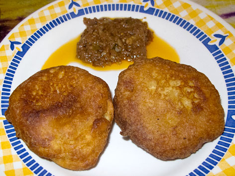 Sierra Leone-style banana pancakes with pepper sauce, from Tiwai Island, Sierra Leone