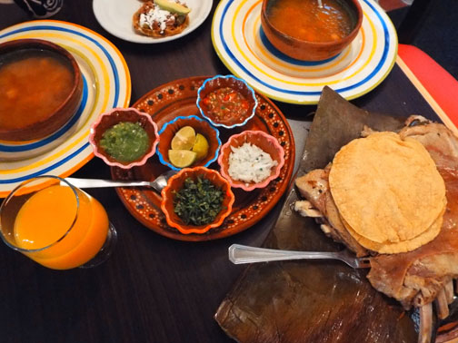 Barbacoa with consome, sopes, and salsas in Mexico City 