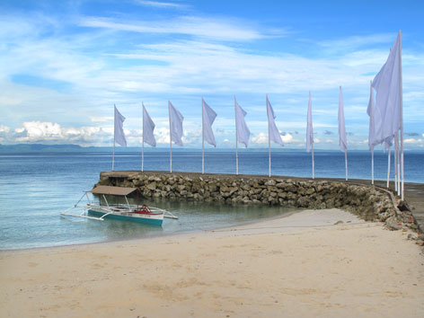 Flags on a beach in Cebu, the Philippines