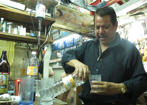 Man drinking mezcal in Oaxaca