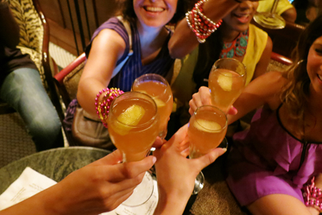 Girls drinking French 75s in New Orleans