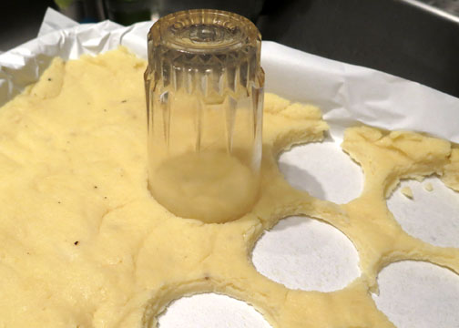 Cutting Roman-style gnocchi out with a glass