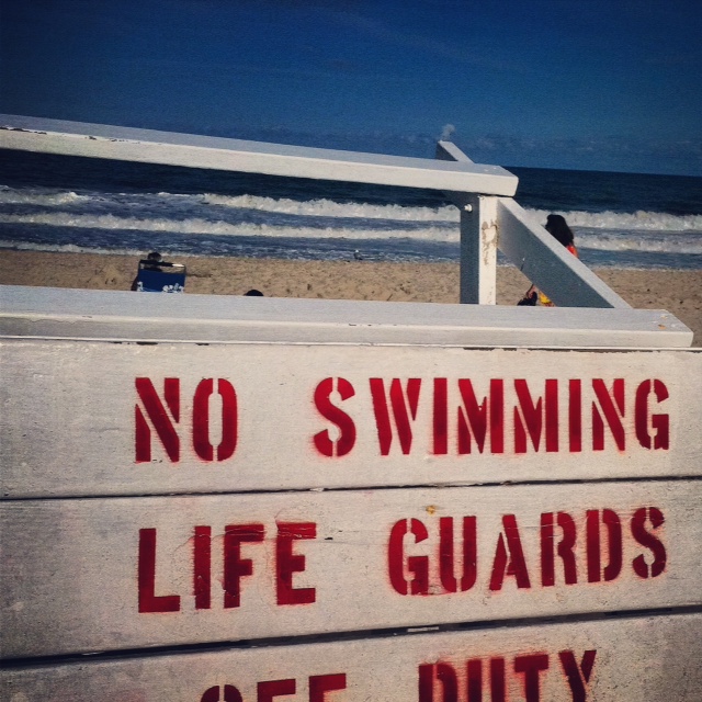 No Swimming sign on the Jersey shore.