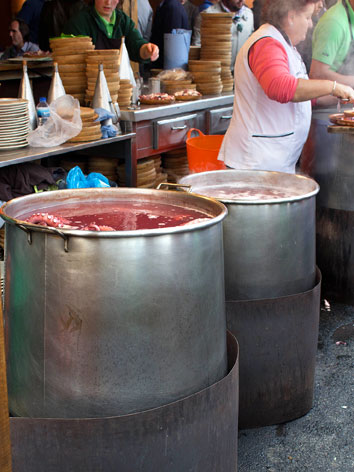 Cauldrons of polbo (octopus) at a market in Galicia, Spain