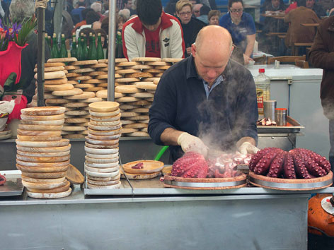 A polbo (octopus) vendor, or pulpeira, in Galicia, Spain