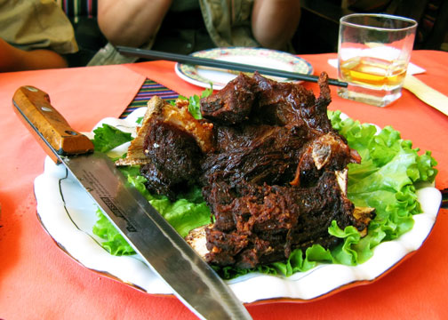 A plate of yak meat in a restaurant in Tibet.