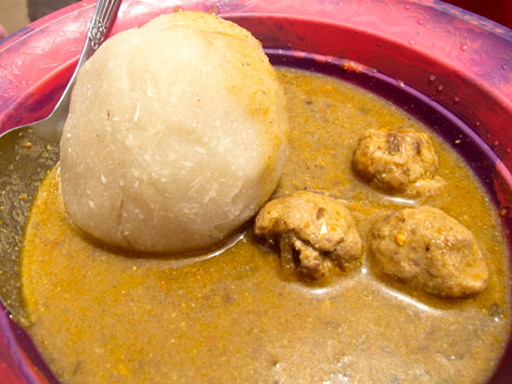 A bowl of foofoo with fish balls from Moyamba Junction, Sierra Leone.