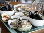 A spread of local Tasmanian oysters and shellfish from Bangor Wine and Oyster Shed in Hobart, Tasmania.
