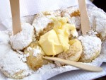 Poffertjes with butter and powdered sugar from the Noordermarkt in Amsterdam, the Netherlands