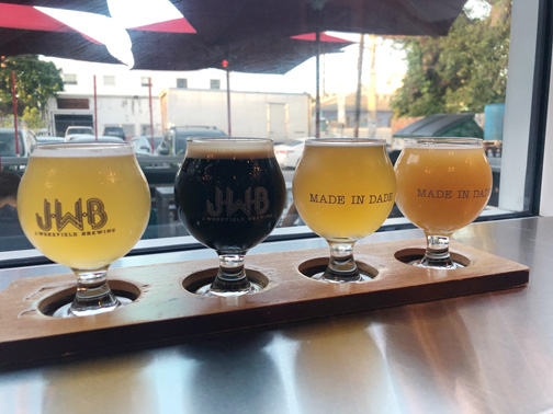 A sampler of four local beers from J Wakefield Brewery in Wynwood, Miami, Florida.