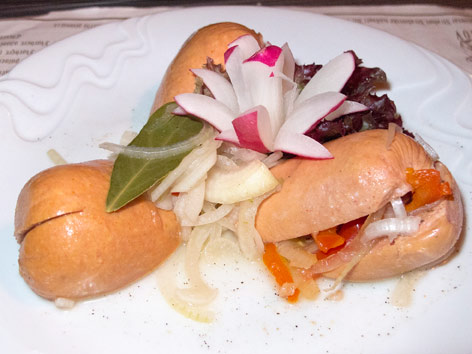 Utopenci, pickled sausages, are a classic Czech pub snack you shouldn't miss in Prague.