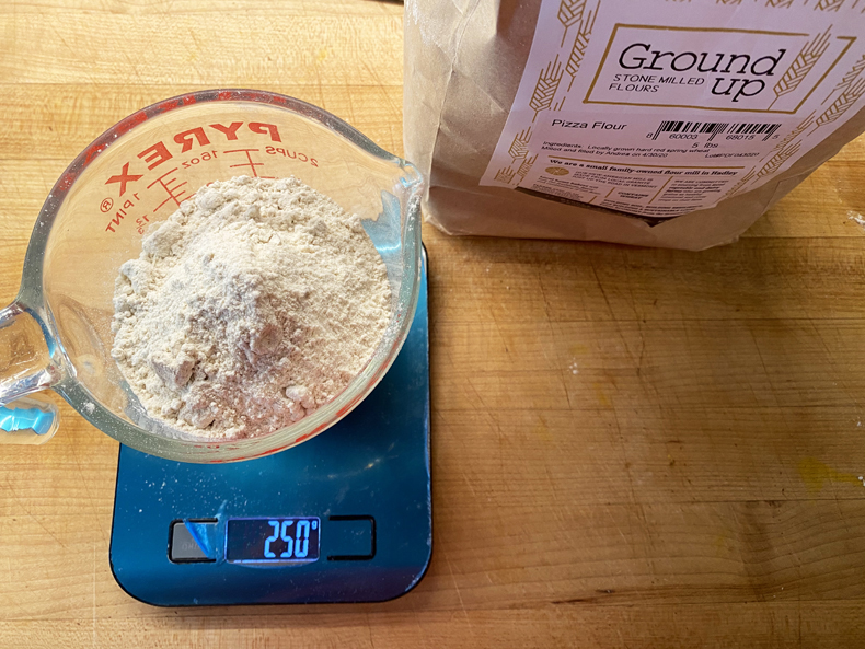A home kitchen food scale measuring flour