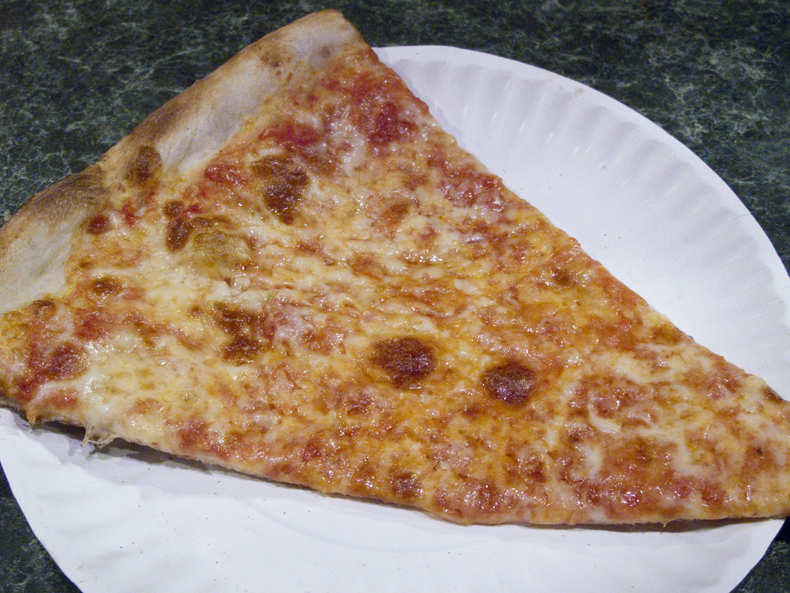 Classic slice of cheese pizza from Joe's in Greenwich Village, NYC