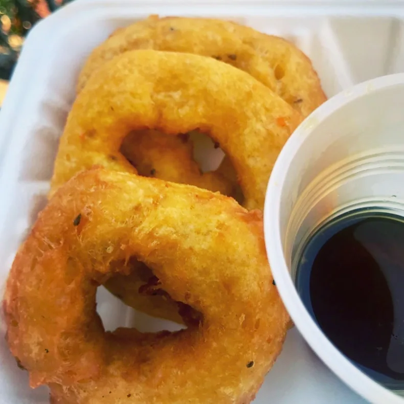 Peruvian picarones, sweet potato and squash doughnuts, from a street vendor in Jackson Heights, Queens.