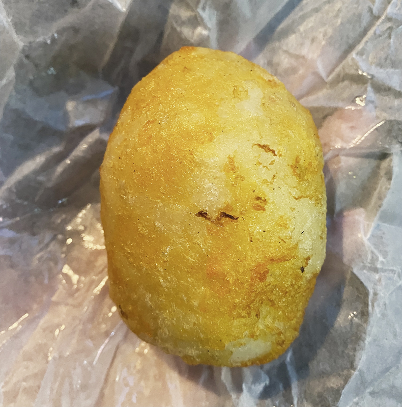A Guyanese egg ball from Tropical Isle in Richmond Hill, Queens