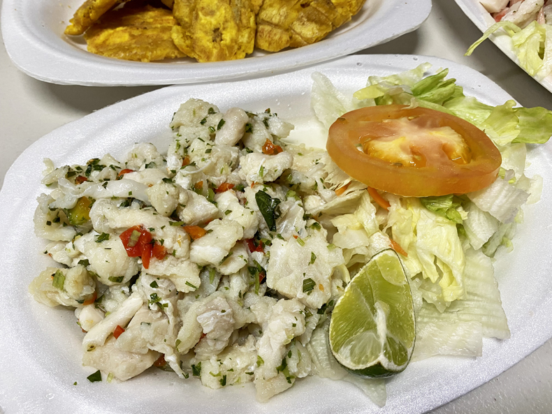 Fish ceviche served with tostones, or fried plantains, is a typical meal along the Puerto Rican coast.