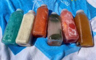 Colorful frozen nutcracker cocktails sold on the beach at Rockaway Beach