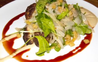 Roasted cauliflower salad from Le Comptoir Charcuteries et Vins, a classic buvette in Montreal, Quebec