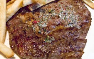The Delmonico steak with fries from New York City's Delmonico's Restaurant.