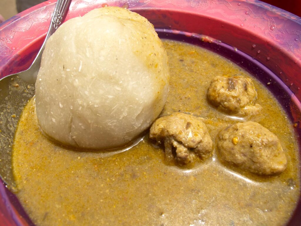 A bowl of foofoo with fish balls from Moyamba Junction, Sierra Leone.