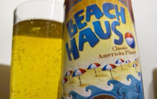 A bottle and glass of Beach Haus local craft beer from the Jersey Shore.