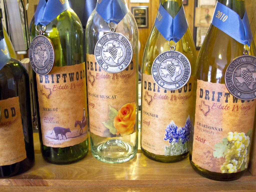 Driftwood Estate Winery wine bottles in Texas.