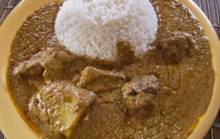 Mafe, a typical Senegalese dish pictured from a Dakar restaurant