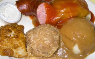 Polish food with stuffed cabbage, pierogi, and kielbasa from Polish Village Cafe in Detroit.