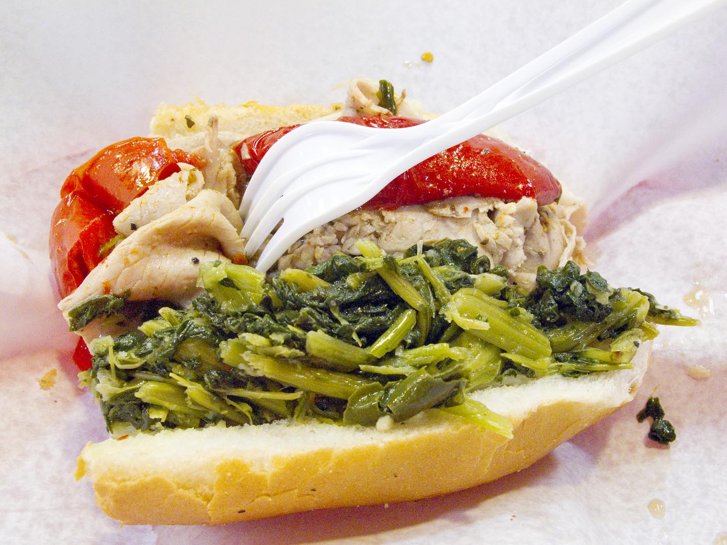 A roast pork sandwich with broccoli rabe from DiNic's in Philadelphia.