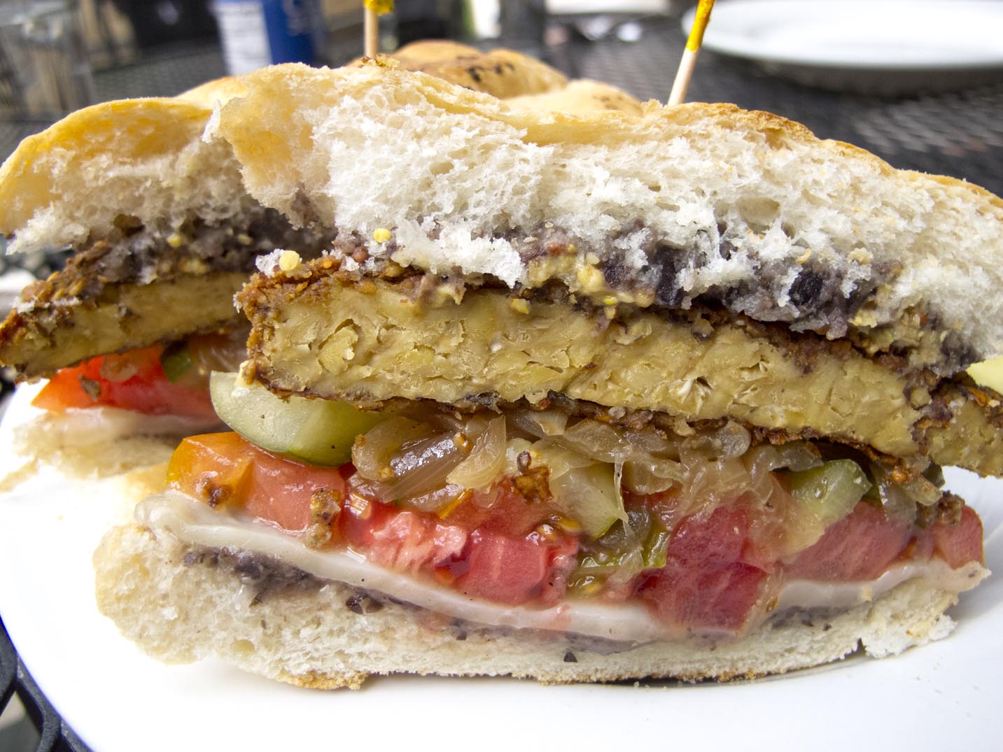 A vegan Havana Cuban sandwich made of tempeh from Laughing Seed in Asheville, North Carolina.