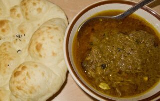 Chicken ishtu and tandoori roti from Purani Dilli in Delhi, India.