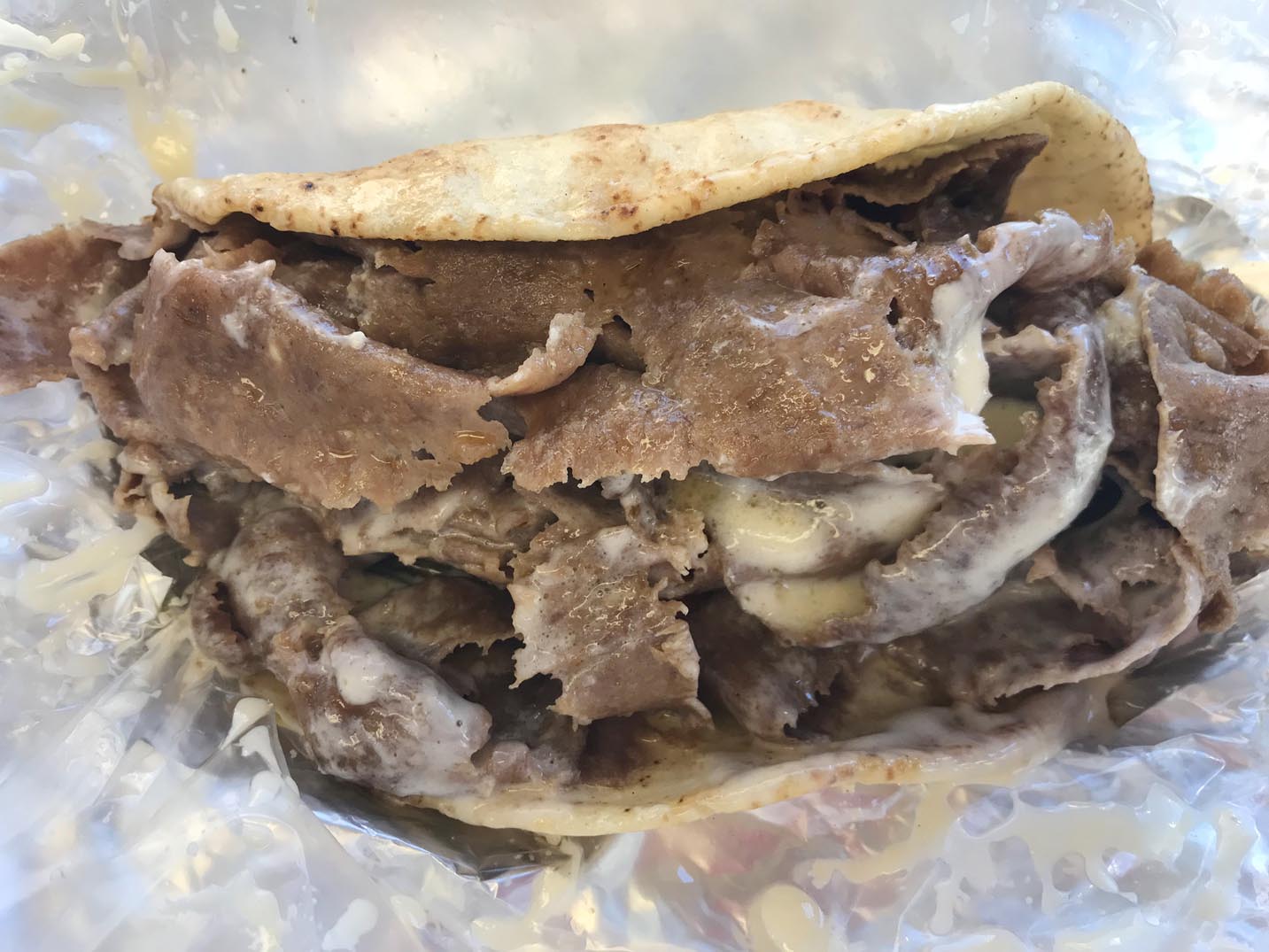 A classic donair in pita bread with white sauce from Tony's in Halifax, Nova Scotia