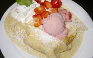 A typical Czech palacinky, or sweet pancake, from Kavárna Slavia in Prague, Czech Republic