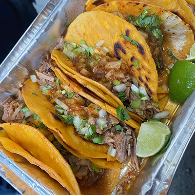 A container of birria tacos.