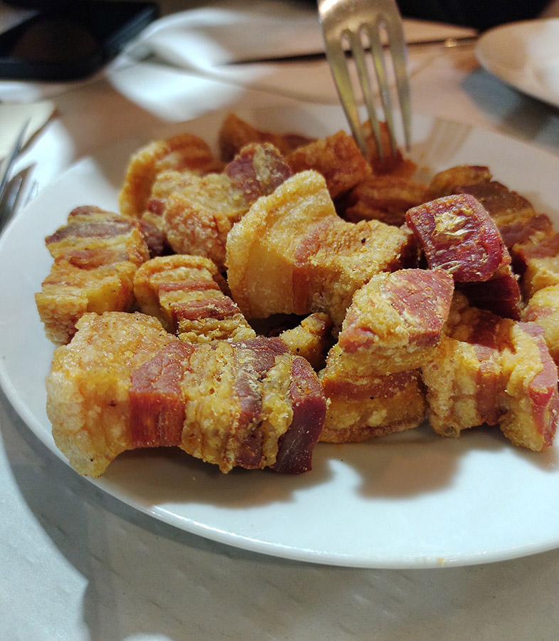Torreznos, fried pieces of crispy pork belly, from Casa Dani in Mercado de La Paz, Madrid.