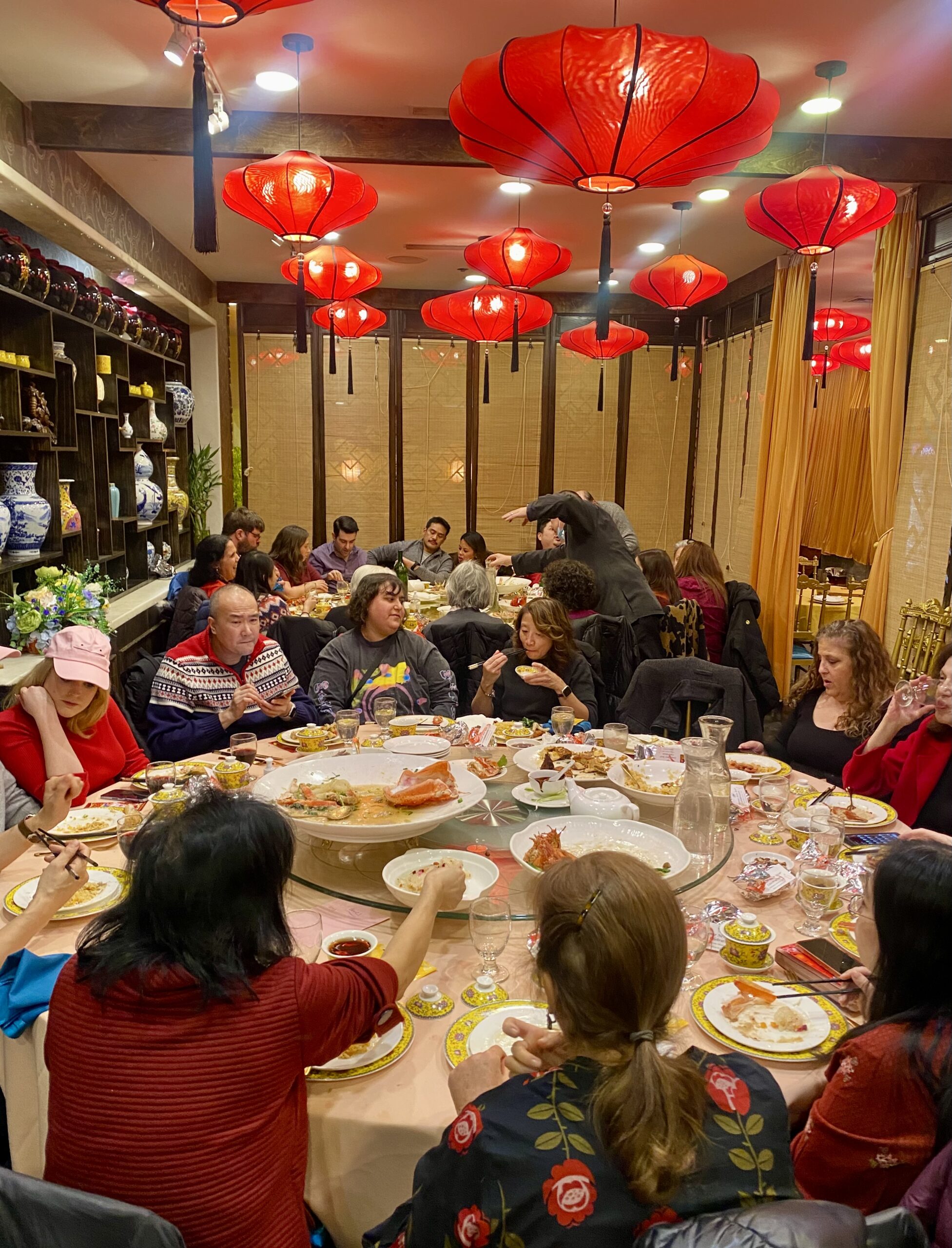 A group of people gather for a Lunar New Year dinner in Queens