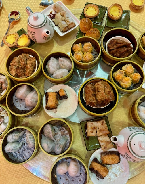 A dim sum spread at a restaurant in Queens Chinatown, NYC.