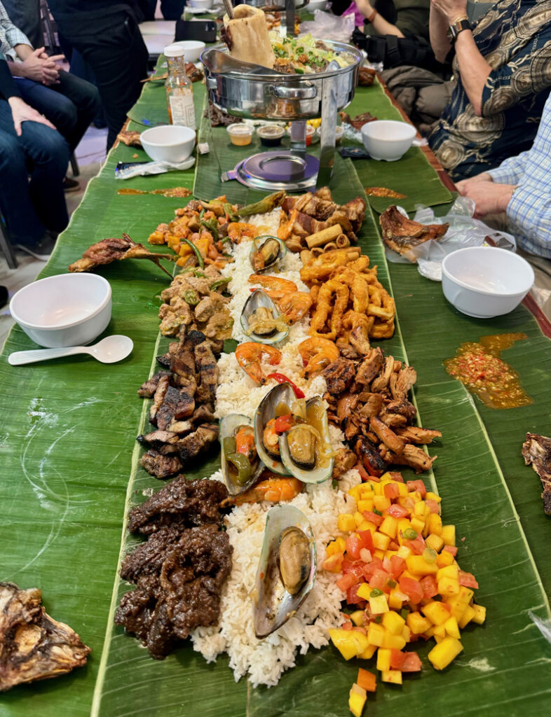 A community meetup over Fliipino kamayan at Kabayan, in Queens, A traditional kamayan feast at Kabayan in Queens, NYC