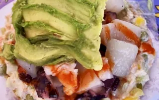 A loaded seafood tostada from the popular La Guerrerense Carreta (food cart) in Ensenada, Baja California.
