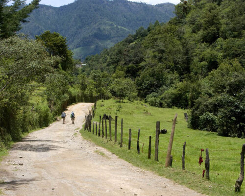 Two hikers on a Quetzaltrekkers trek through the Guatemalan highlands.
