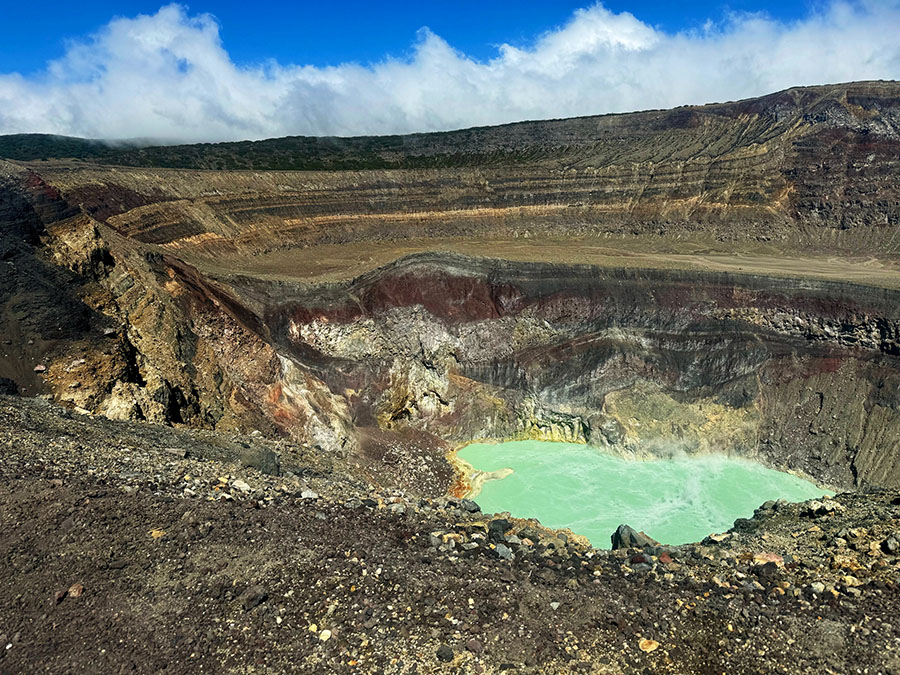 The light turquoise crater lake in the center of Santa Ana volcano in El Salvador.